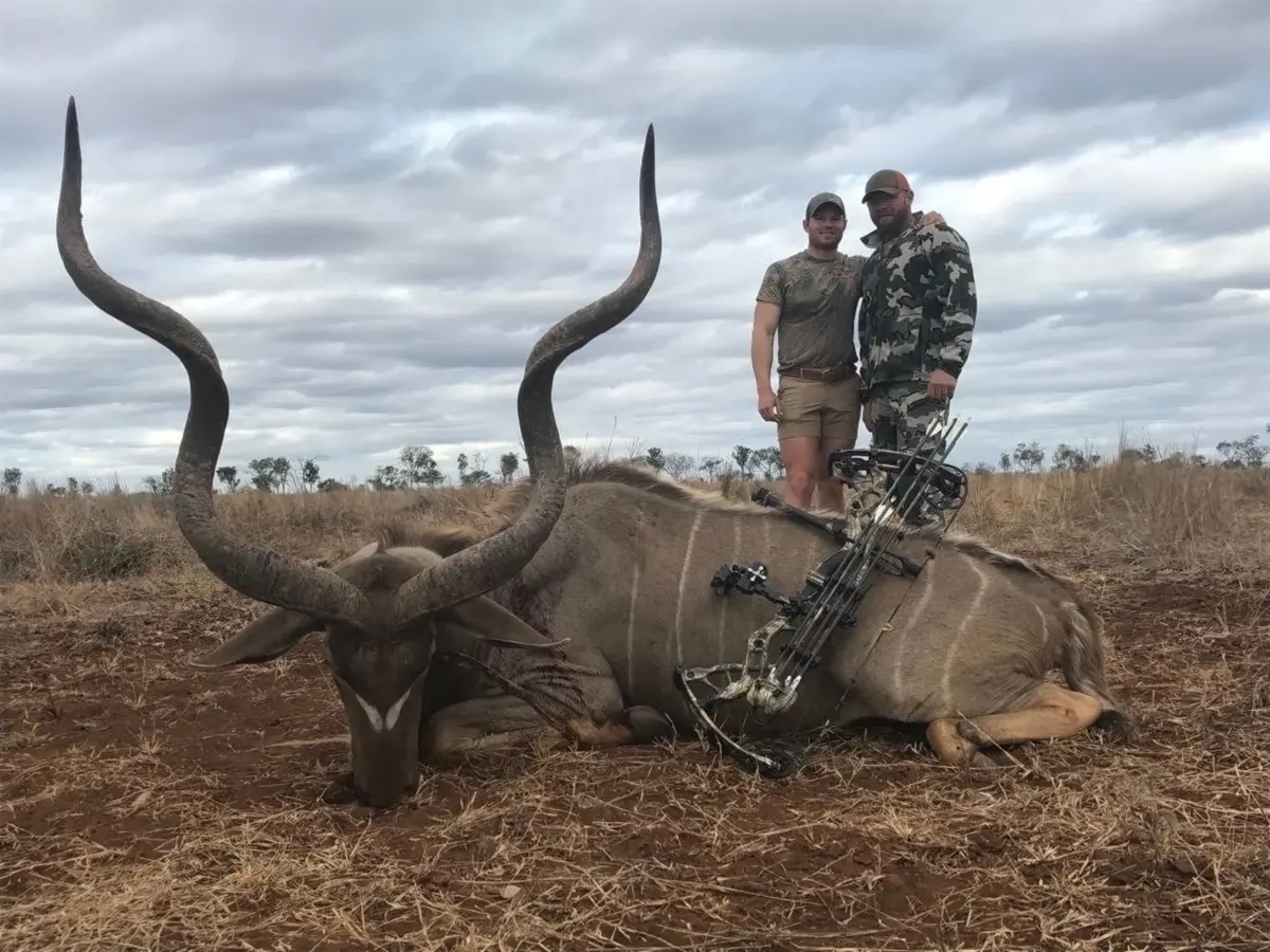 Price for Kudu hunting in South Africa - Hunters with a trophy Kudu bull.